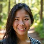 Energetic portrait of Sarah Chen, a female guide in her 20s with a backpack and bright smile, ready for adventure