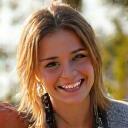 Chloe Davis, a young woman in her 20s with a vibrant, adventurous spirit